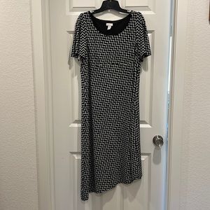 Chico’s Black and white, short sleeved, asymmetric dress. Empire waistline.